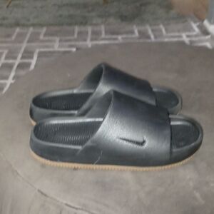 Black Slide Sandals with Tan Soles. "Nike" M/10 W/11 size.